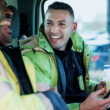 Workers smiling in Van