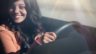 Young Woman Brown Hair Behind Steering Wheel